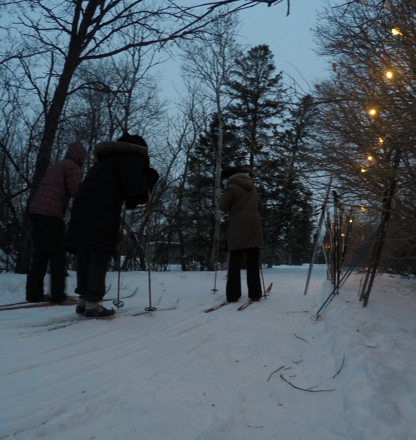 night time skiiers and fairy lights